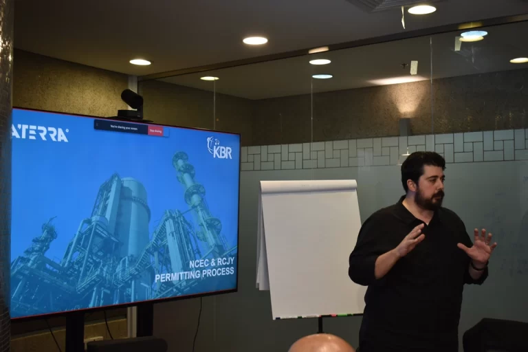 Amer B. Alzubaidi from Staterra delivering a presentation to AMCDE KBR